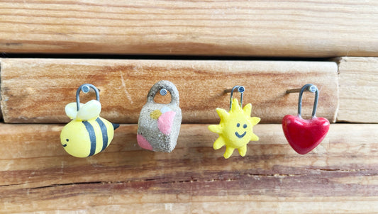 Bee charm (far left)